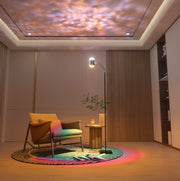 EP LIGHT Dual Head Floor Lamp Aurora Projector Lights illuminating a cozy interior with colorful patterns on the ceiling.